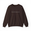 Minimalist Black Crewneck Sweatshirt with Tiny Center Text